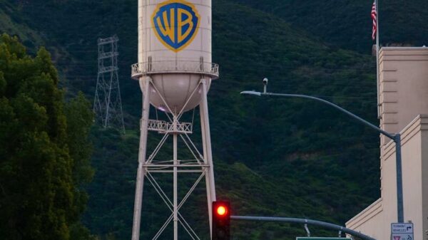 View of the iconic Warner Bros water tower in Burbank, California during sunset.