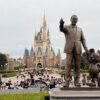 Statue of Walt Disney and Mickey Mouse in front of Cinderella Castle, Tokyo Disneyland.
