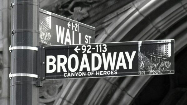 a black and white photo of a street sign