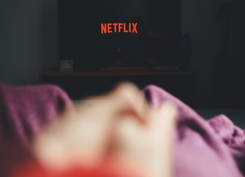 Relaxing indoors with Netflix, showcasing a typical weekend vibe.