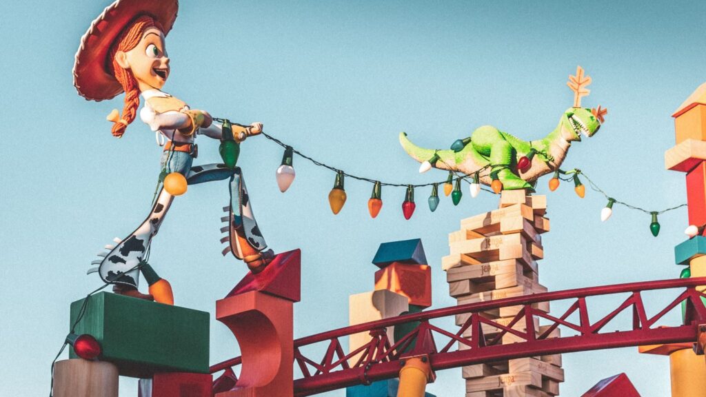Toy Story characters Jessie and Rex in vibrant scene at Orlando park