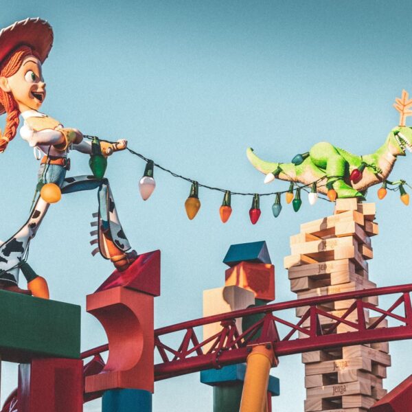 Toy Story characters Jessie and Rex in vibrant scene at Orlando park