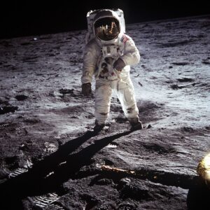 Historic image of an astronaut on the moon during the Apollo mission, showcasing space exploration.
