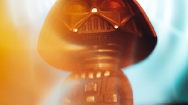 Miniature Darth Vader figurine with vibrant light effects adds a touch of fantasy.