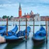 Charming view of San Giorgio Maggiore and gondolas in Venice, Italy, with a beautiful water canal scene.