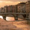 Beautiful sunset view of the historic Latin Bridge over Miljacka River in Sarajevo, Bosnia.