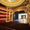 The opulent interior of Palais Garnier in Paris, showcasing its grand architecture.