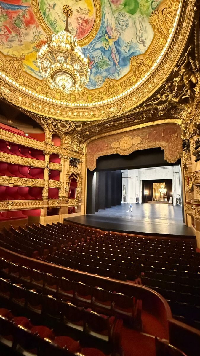 The opulent interior of Palais Garnier in Paris, showcasing its grand architecture.