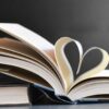 Open book with pages forming a heart, symbolizing love for reading and literature.