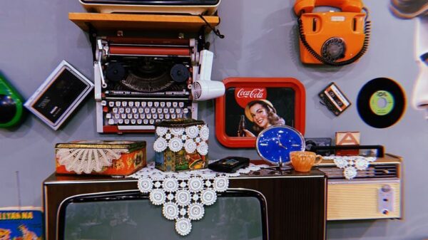 A nostalgic collection of vintage electronics and decor items on display in a cozy setting.